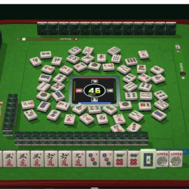 A Mahjong game in progress with tiles arranged and players' hands displayed.